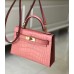 Hermes Kelly Mini II Handmade Bag In Pink Crocodile Embossed Leather