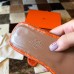 Hermes Oran Slide Sandals In Orange Shiny Niloticus Crocodile Skin