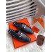 Hermes Oz Mules In Noir Calfskin