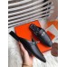 Hermes Oz Mules In Noir Calfskin