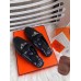 Hermes Oz Mules In Noir Calfskin