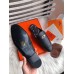 Hermes Oz Mules In Noir Calfskin